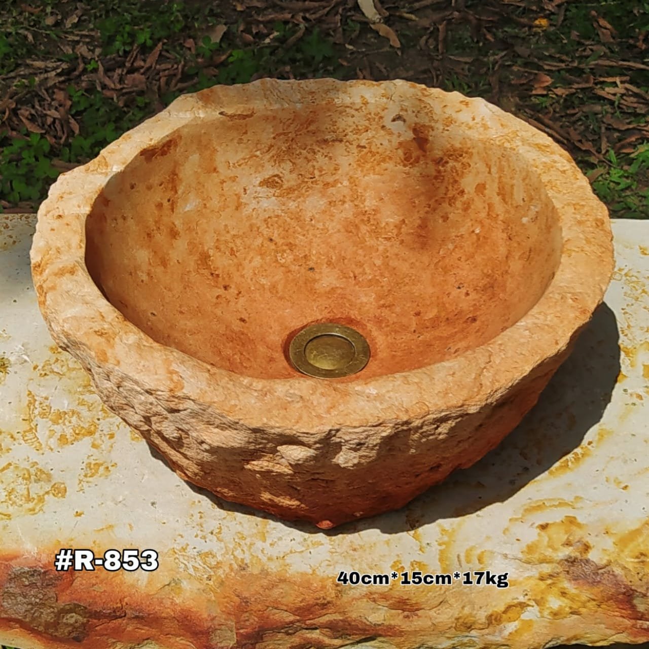 Lavamanos en piedra natural rústico color rojo ocre claro, exterior labrado natural