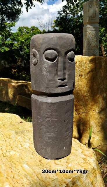 Escultura en piedra fósil