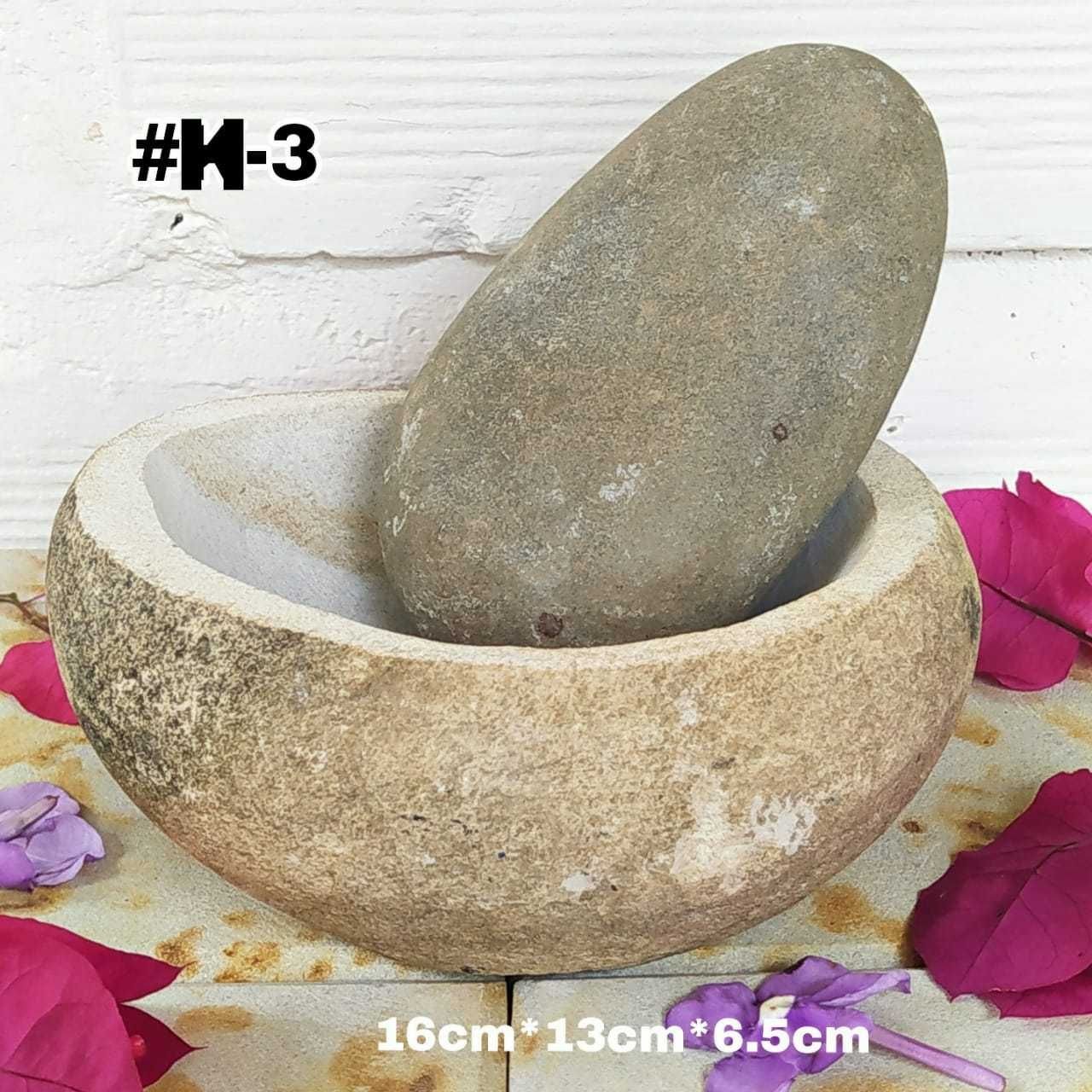 Mortero en piedra de río