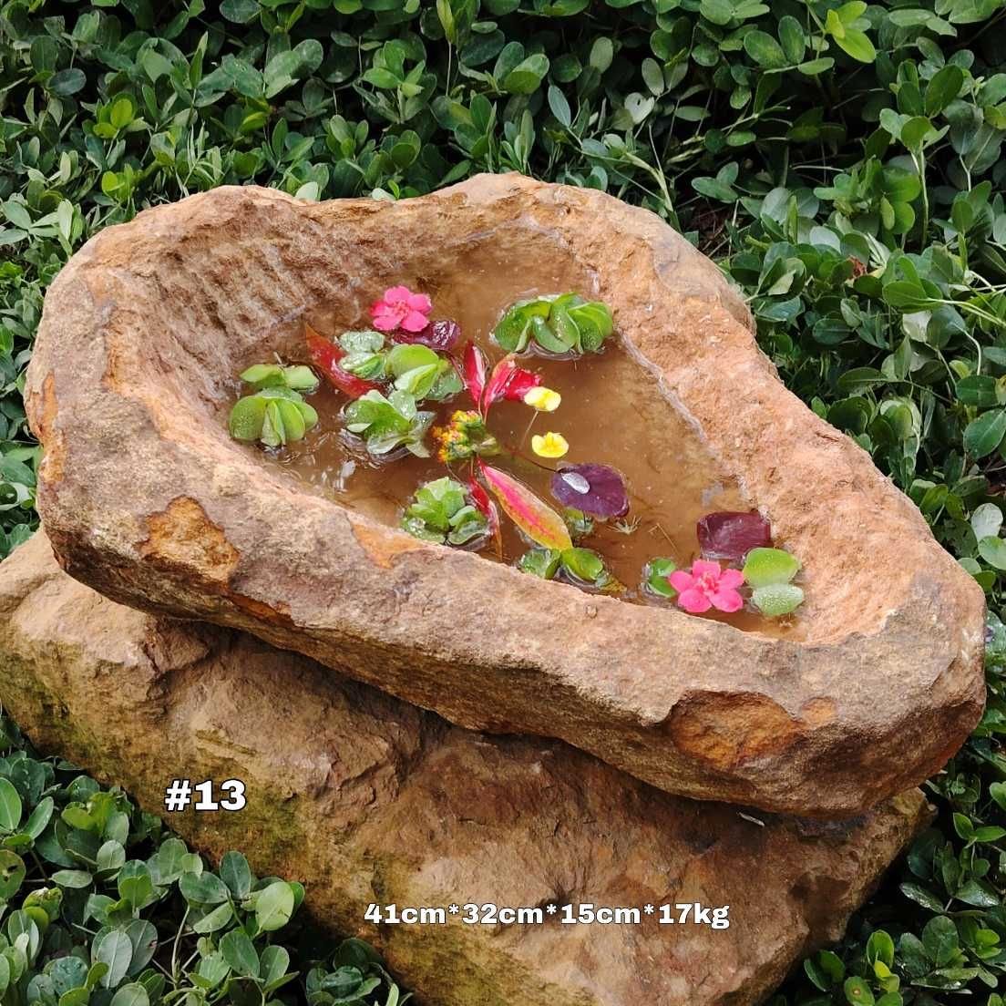 Pila rústica en piedra