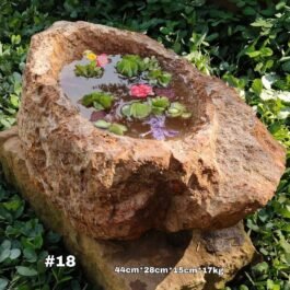 Pila rústica en piedra