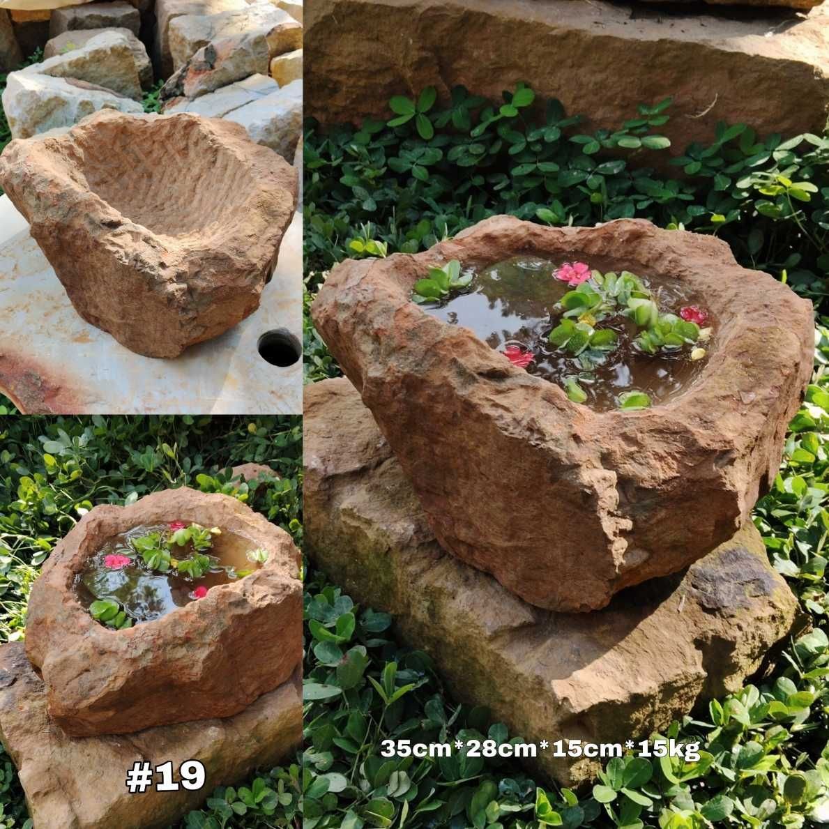 Pila rústica en piedra