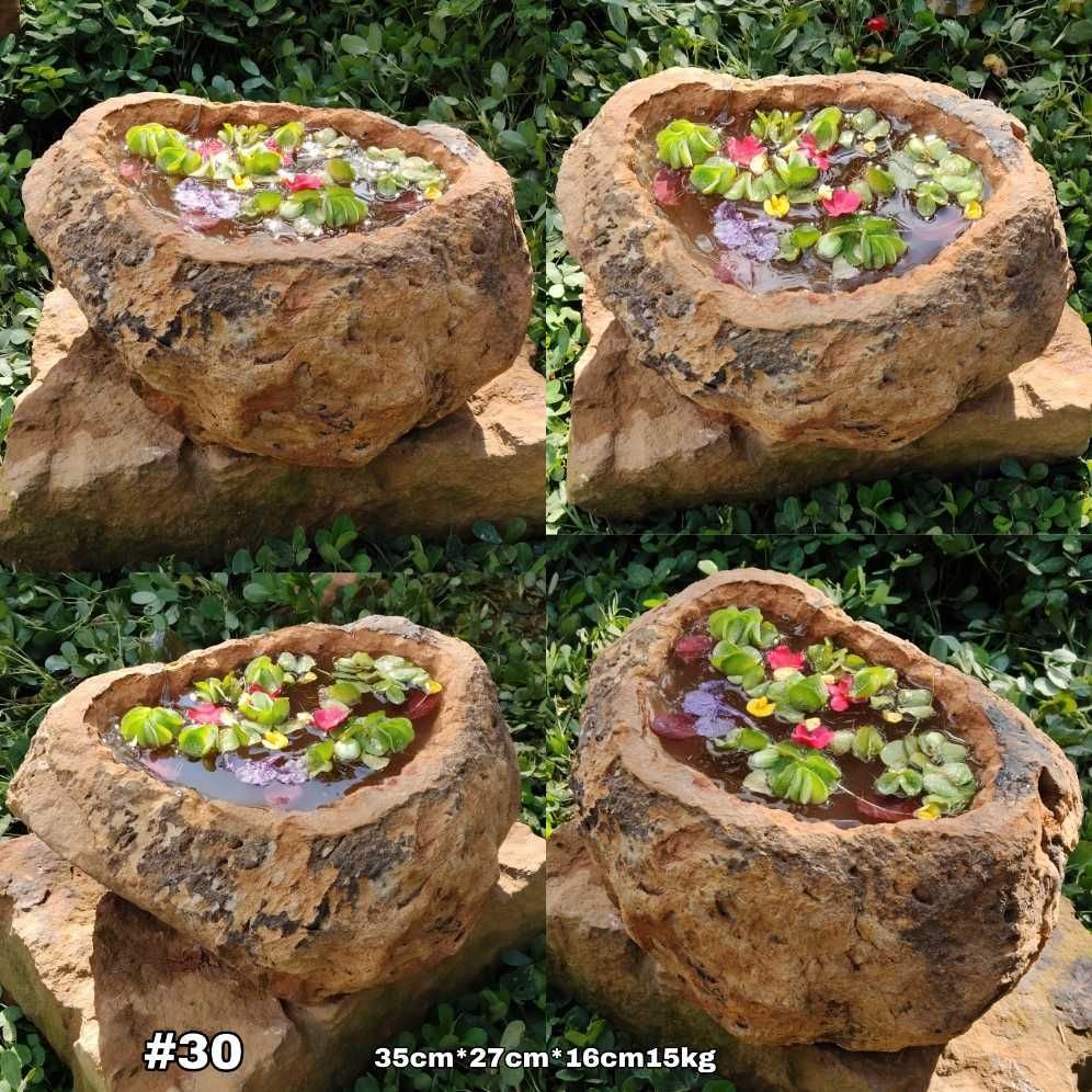 Pila rústica en piedra