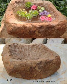 Pila rústica en piedra