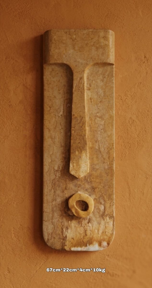 Escultura en piedra para pared