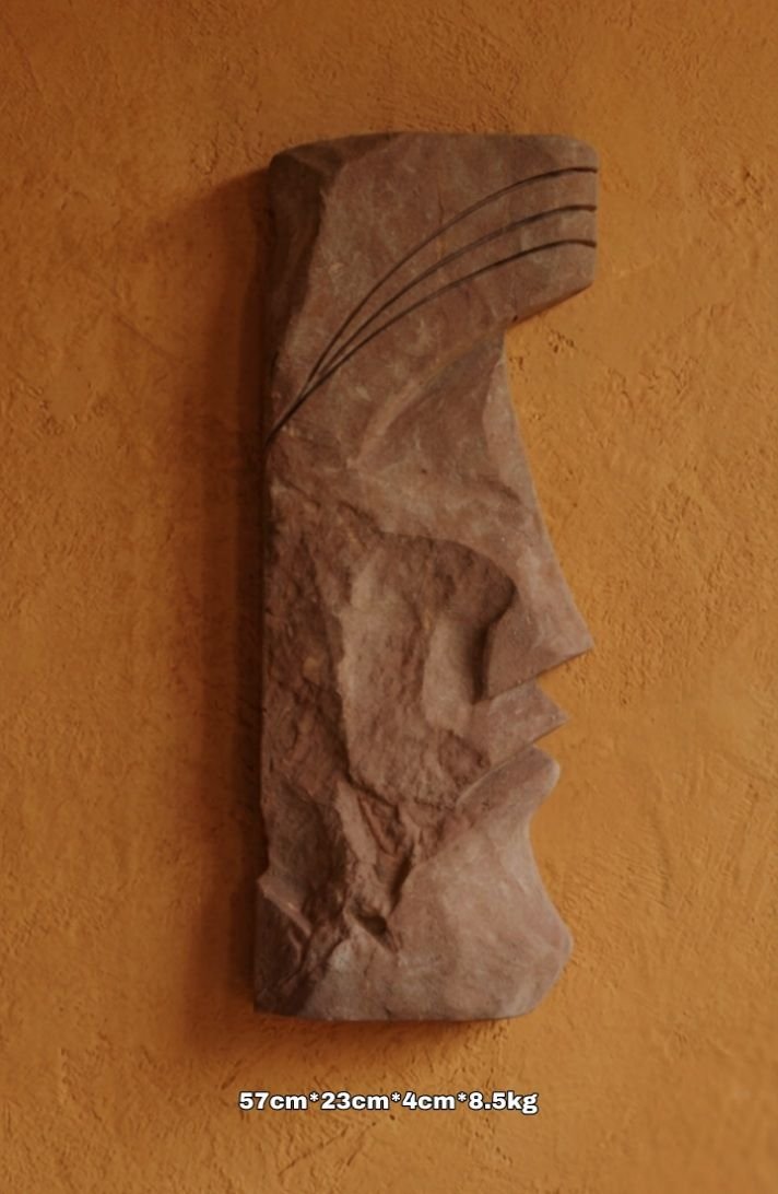 Escultura en piedra para pared