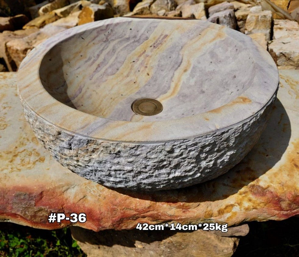 Lavamanos en piedra redondo